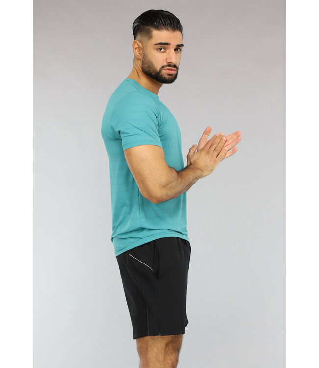 Ademende Turquoise Trainingstenue met Korte Broek