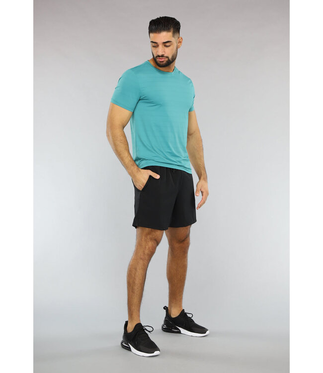 Ademende Turquoise Trainingstenue met Korte Broek