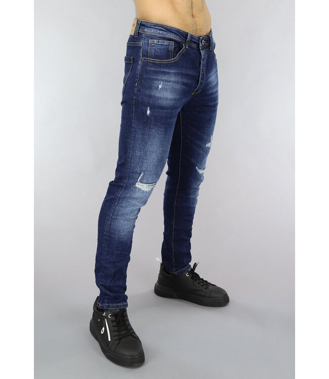NEW0305 Damaged Skinny Jeans met Stiksels in Donkerblauw