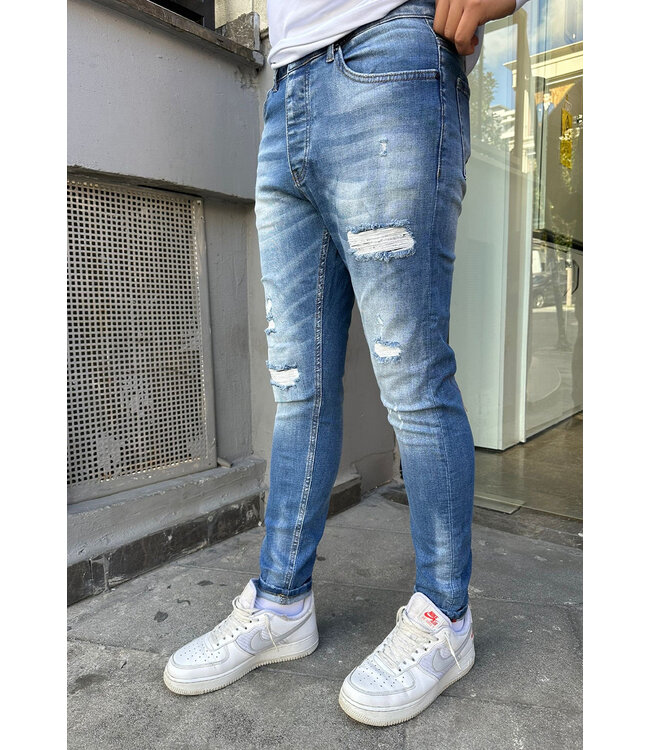 Slim Fit Lichtblauwe Jeans met Wassing en Gescheurde Details voor Heren
