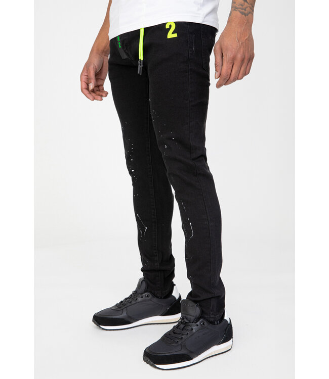 Zwarte Skinny Jeans met Paint Splatter en Neon Detail