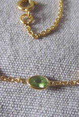 Halsketting goud op zilver en peridot stenen