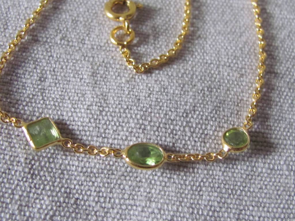 Necklace gold on silver and peridot stones