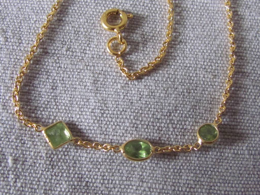 Necklace gold on silver and peridot stones