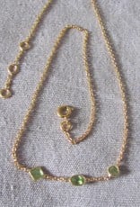 Necklace gold on silver and peridot stones