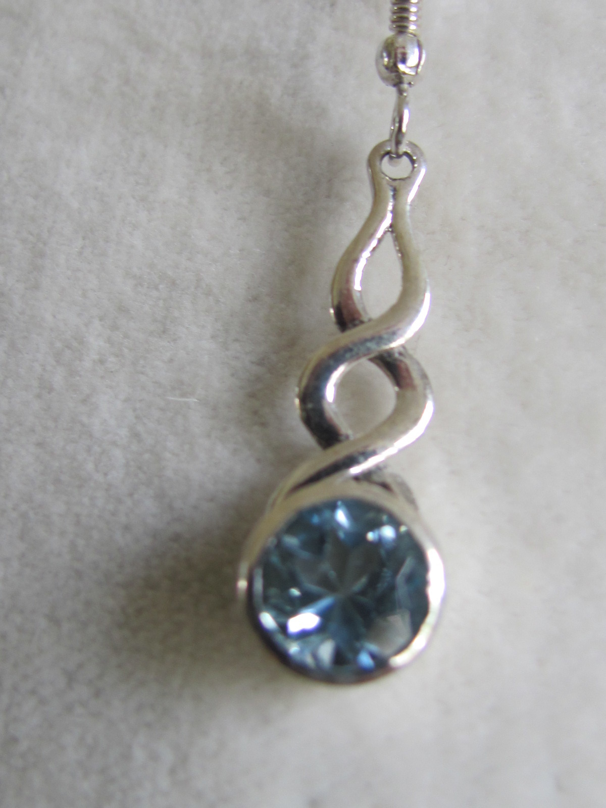 Earring silver with blue topas