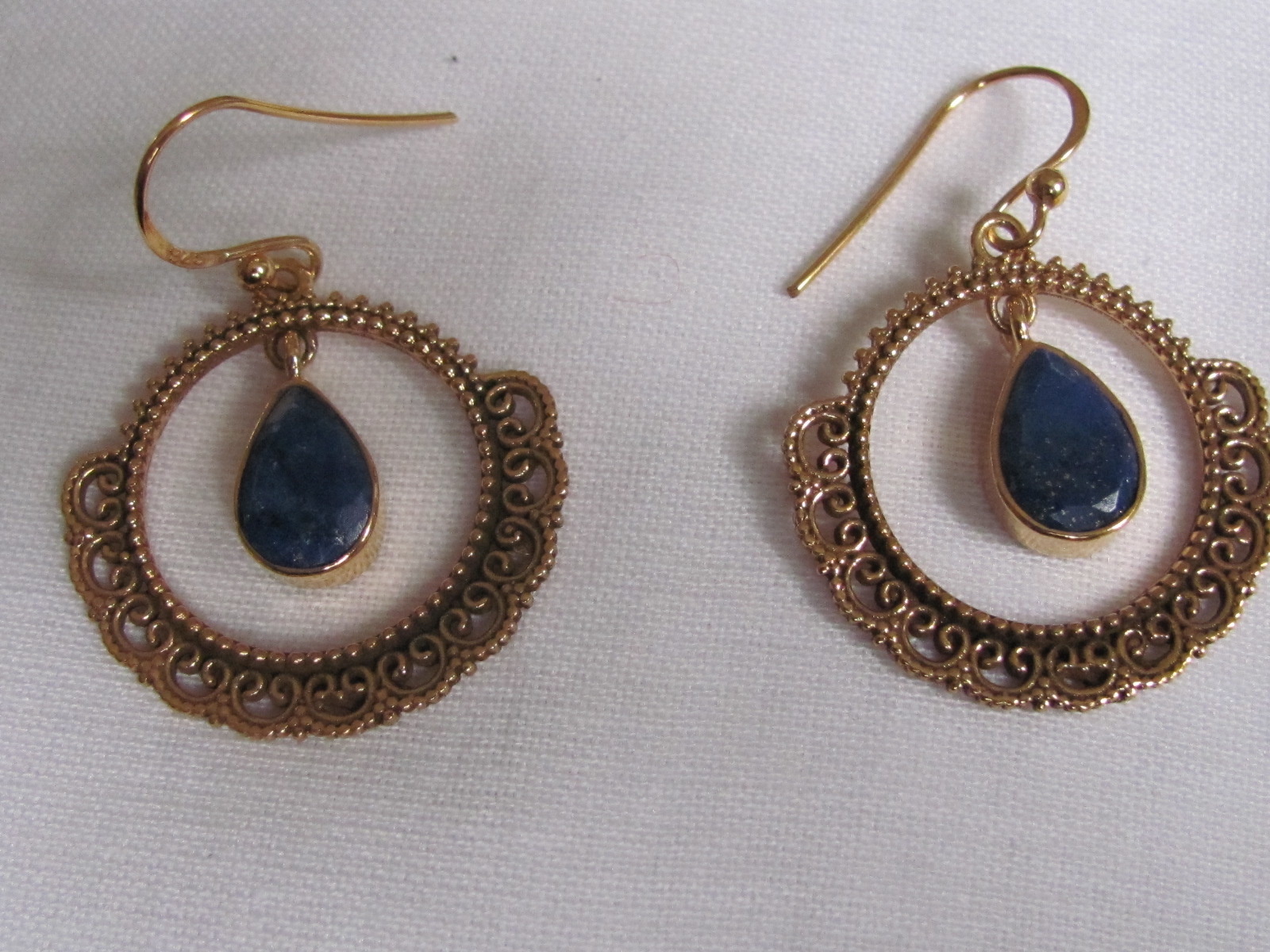 Earring gold on silver with facet cut  lapis lazuli