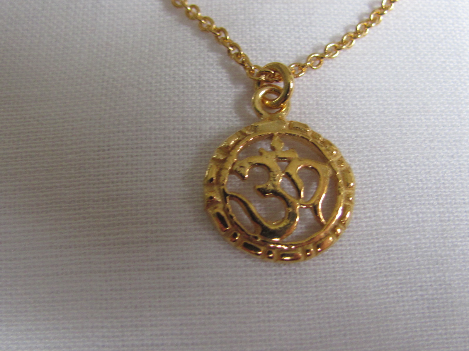 Necklace gold on silver with OHM pendant charm