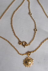 Necklace gold on silver sun charm pendant