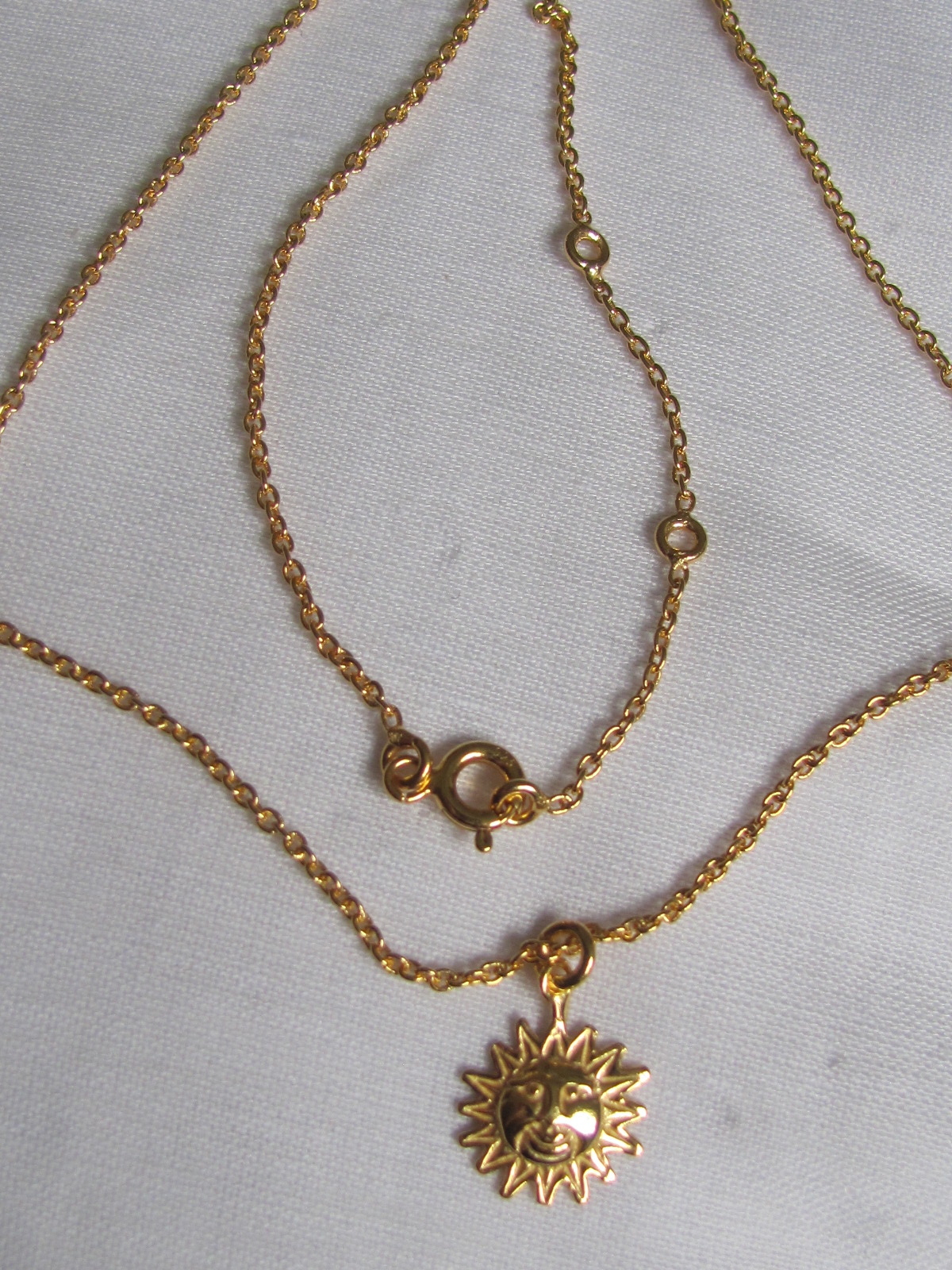 Necklace gold on silver sun charm pendant