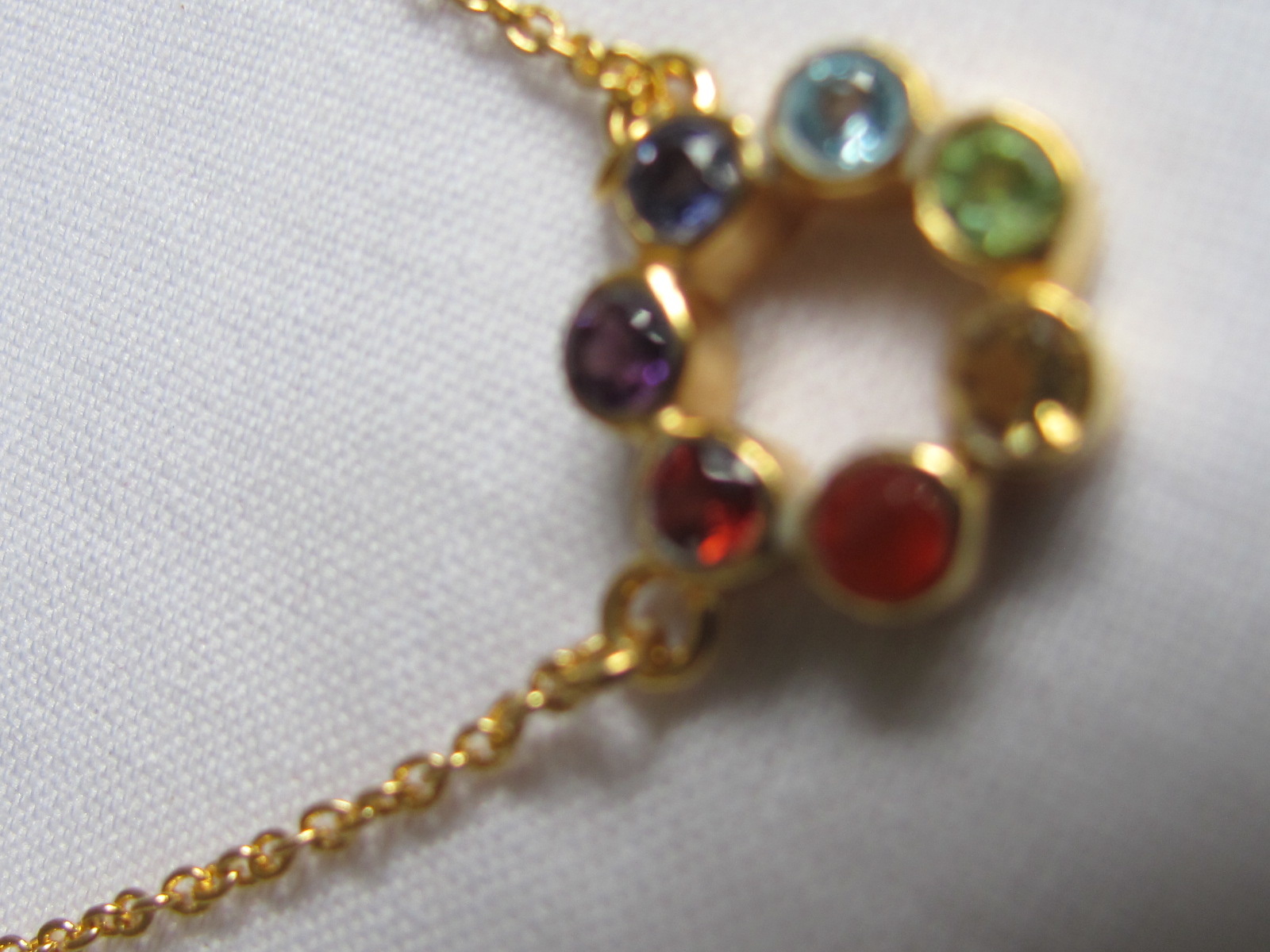 Necklace gold on silver with precious stones