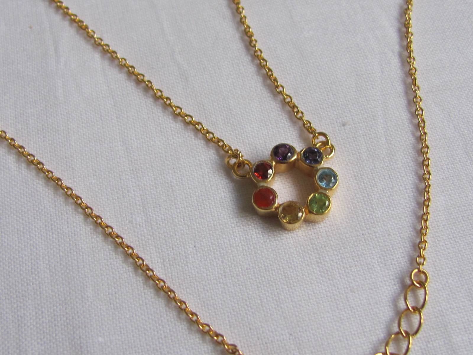 Necklace gold on silver with precious stones