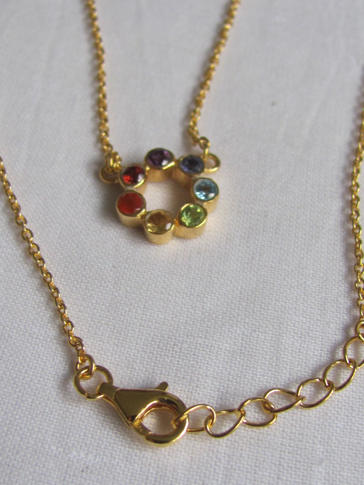 Necklace gold on silver with precious stones