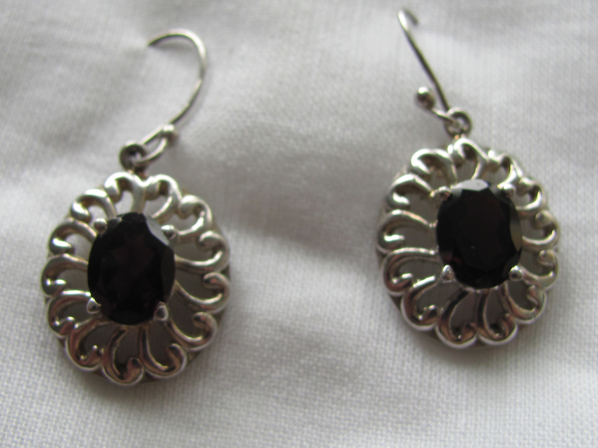 Earrings silver with hand faceted garnet stone