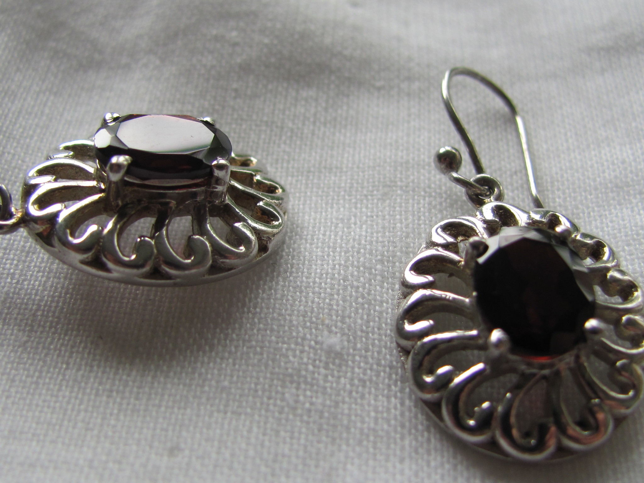 Earrings silver with hand faceted garnet stone