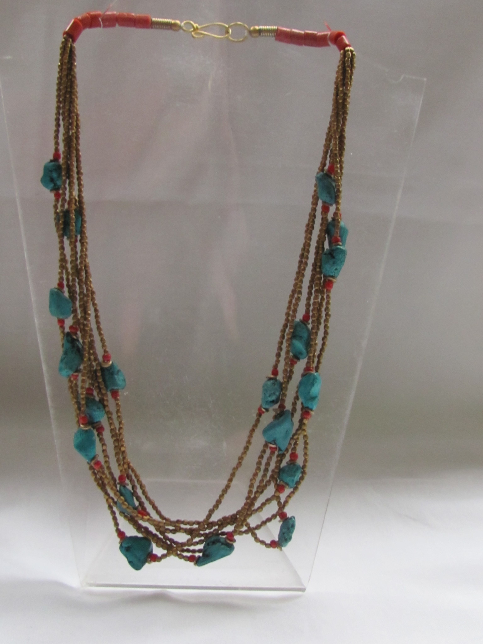 Necklace from brass with imitation turquoise and coral