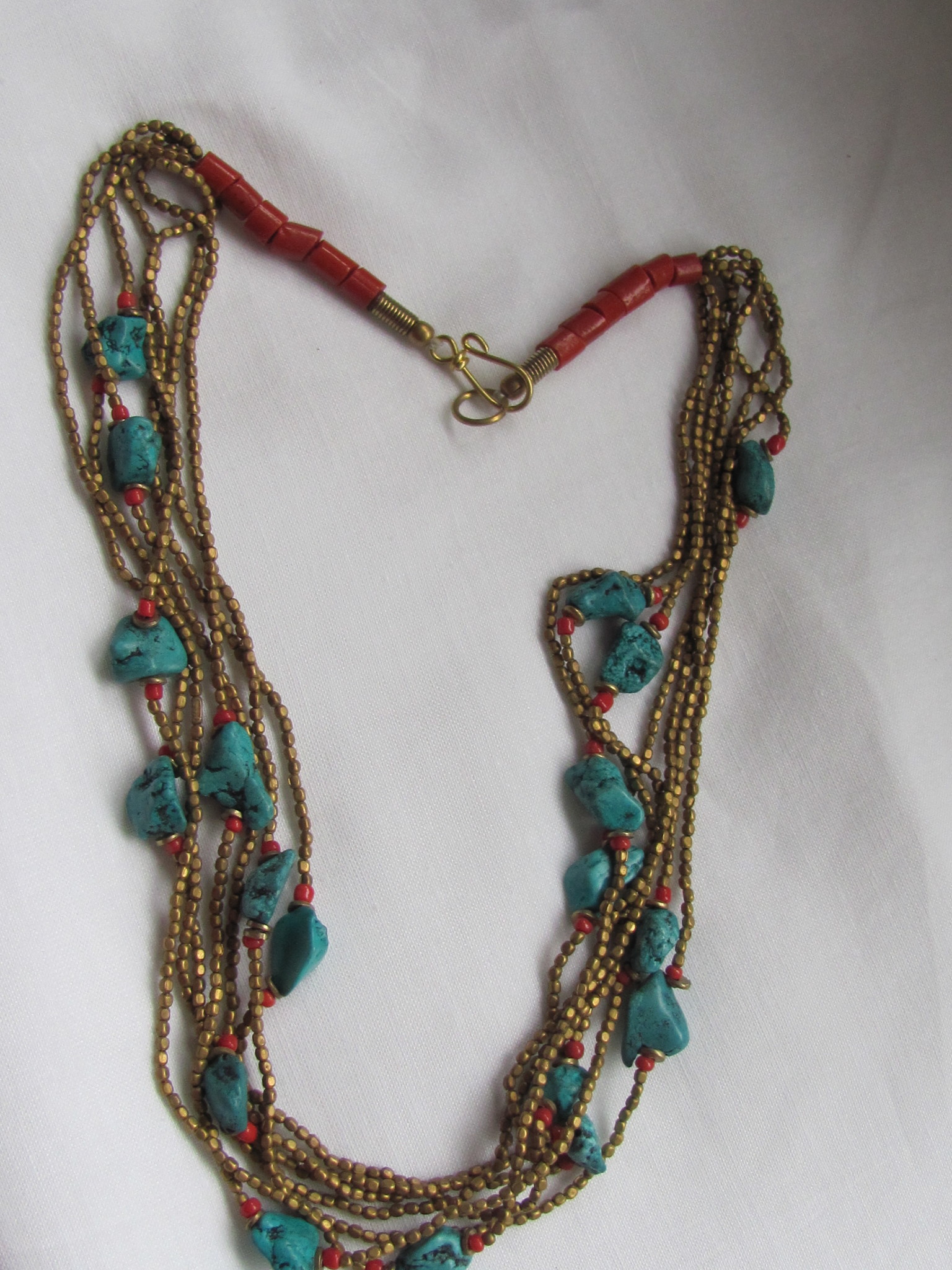 Necklace from brass with imitation turquoise and coral