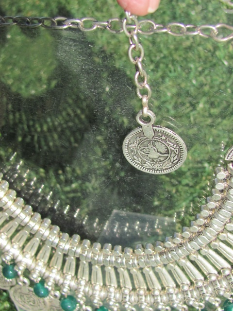 Necklace, white metal tribal style with coins and hand made green glass beads