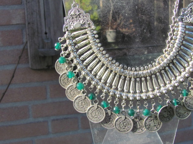 Necklace, white metal tribal style with coins and hand made green glass beads