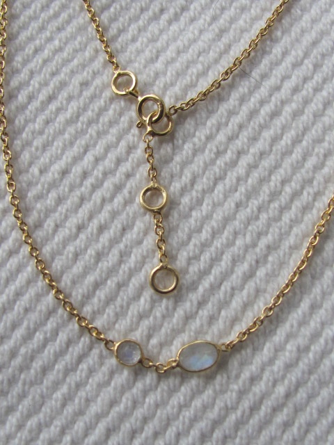 Necklace gold on silver with rainbow moon stones
