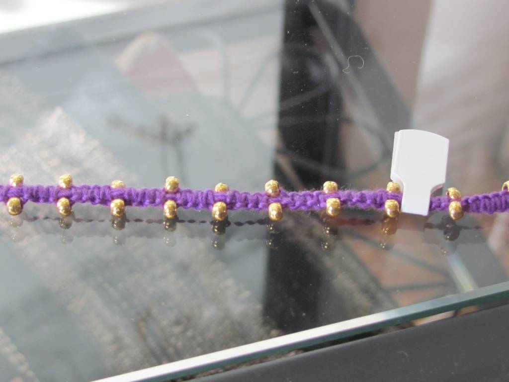 Fine macramé bracelet purple with gold on silver beads