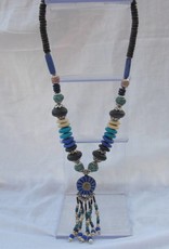 Necklace with beaded tassel and blue medallion