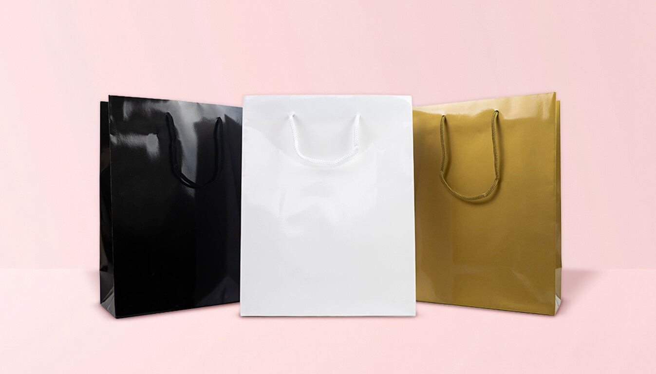 Luxe papieren tassen: welke soorten en handvatten passen bij jouw merk?