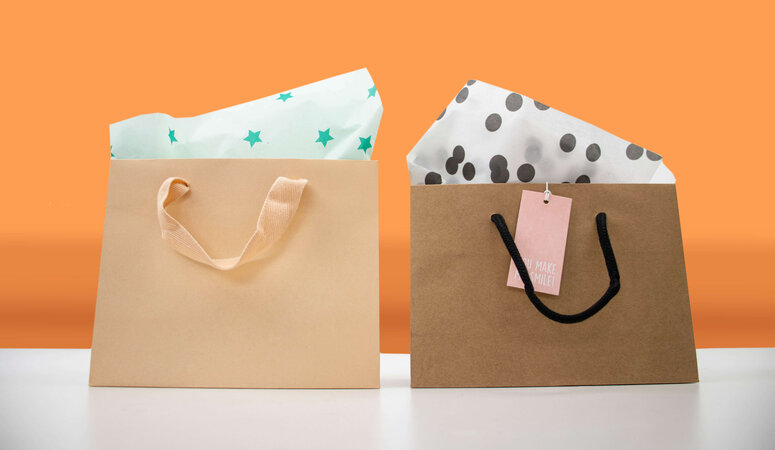 Luxe papieren tassen: sterke en representatieve verpakkingen voor retail
