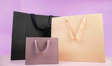 Hoe kies je de juiste luxe papieren tas voor jouw product?