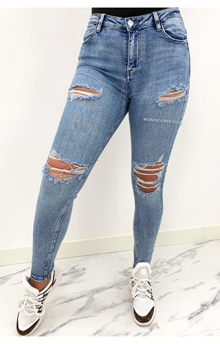 Lichtblauwe High Waist Ripped Jeans met Scheuren - Uwantisell.nl
