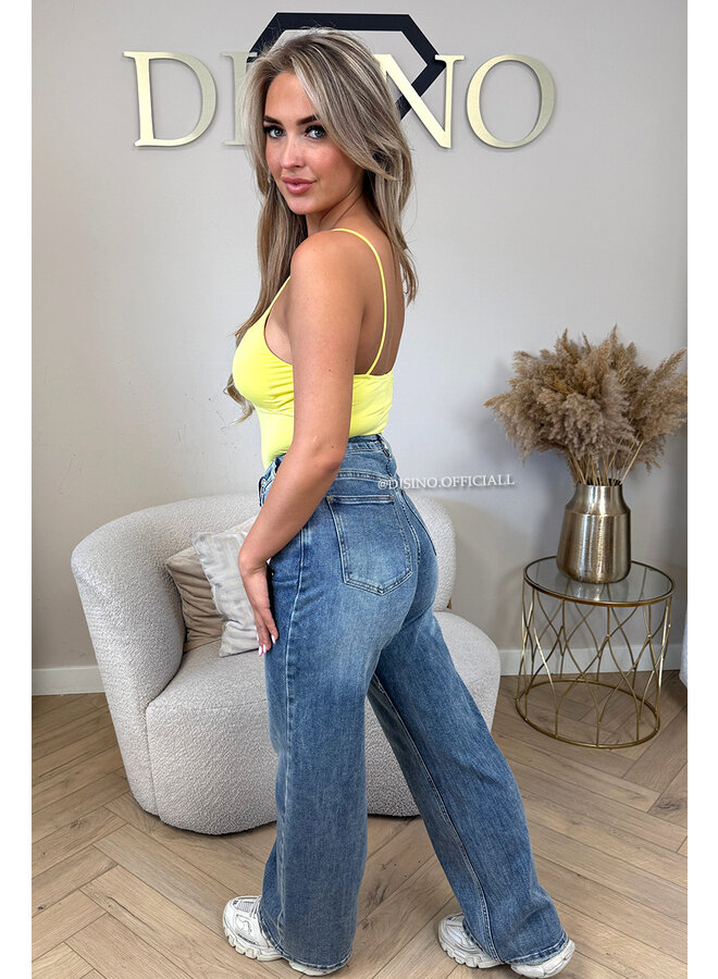 DIRTY BLUE - ' CROSS WAIST JEANS' - SUPER STRETCH VIRAL ASYMMETRIC WIDE LEG JEANS