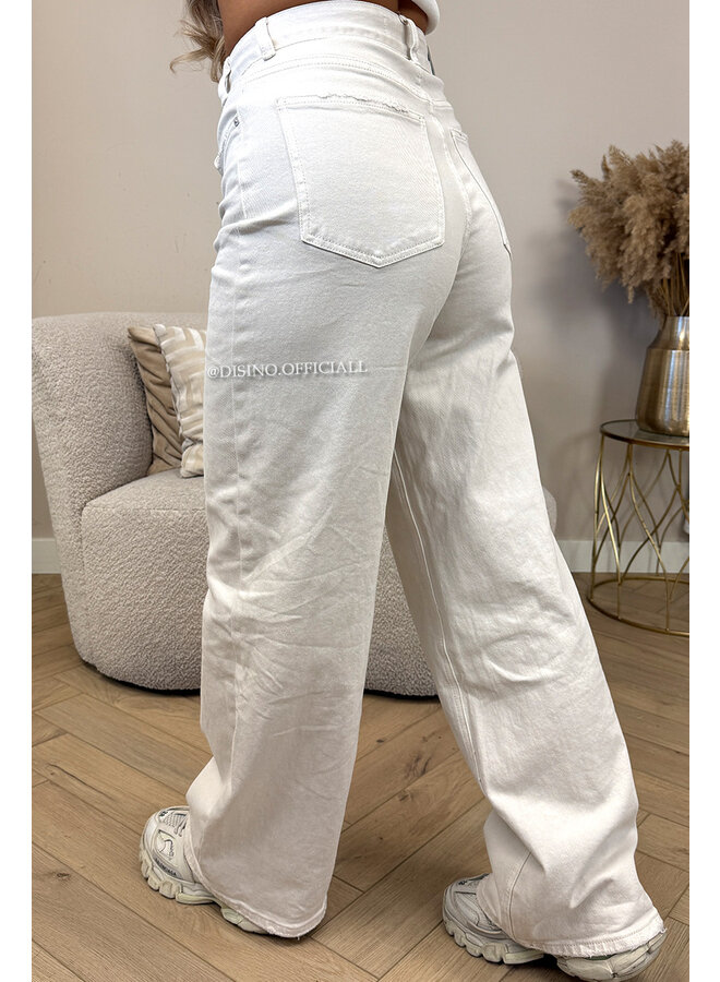 BEIGE - 'AUSTIN JEANS' - STRETCH VIRAL ASYMMETRIC WIDE LEG JEANS