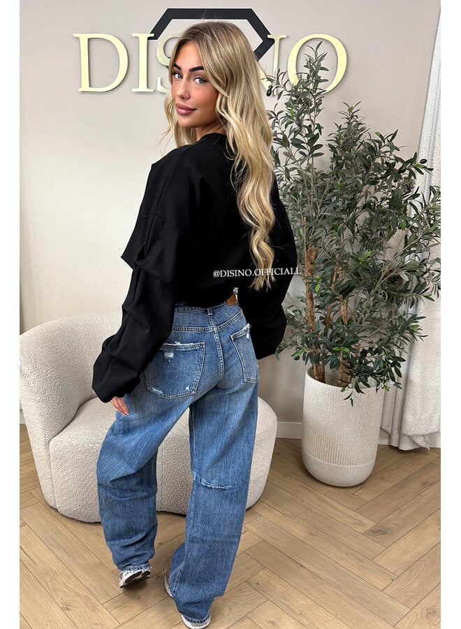 BLACK - ‘SOLÈNE SWEATER’ – OVERSIZED LAYERED RUFFLE SLEEVE SWEATER