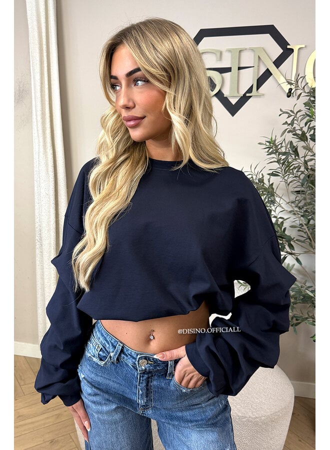 NAVY BLUE - ‘SOLÈNE SWEATER’ – OVERSIZED LAYERED RUFFLE SLEEVE SWEATER