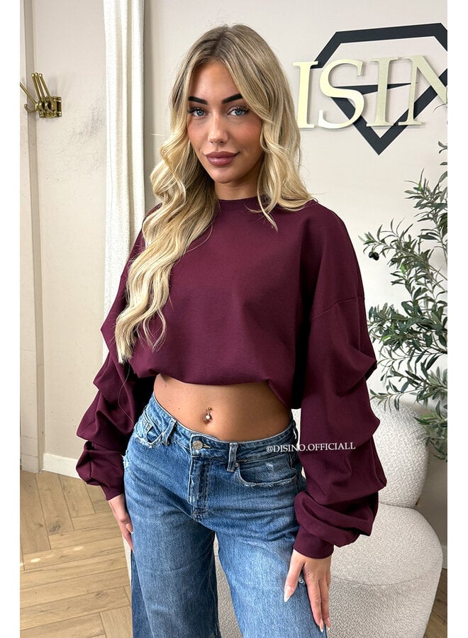 BURGUNDY - ‘SOLÈNE SWEATER’ – OVERSIZED LAYERED RUFFLE SLEEVE SWEATER