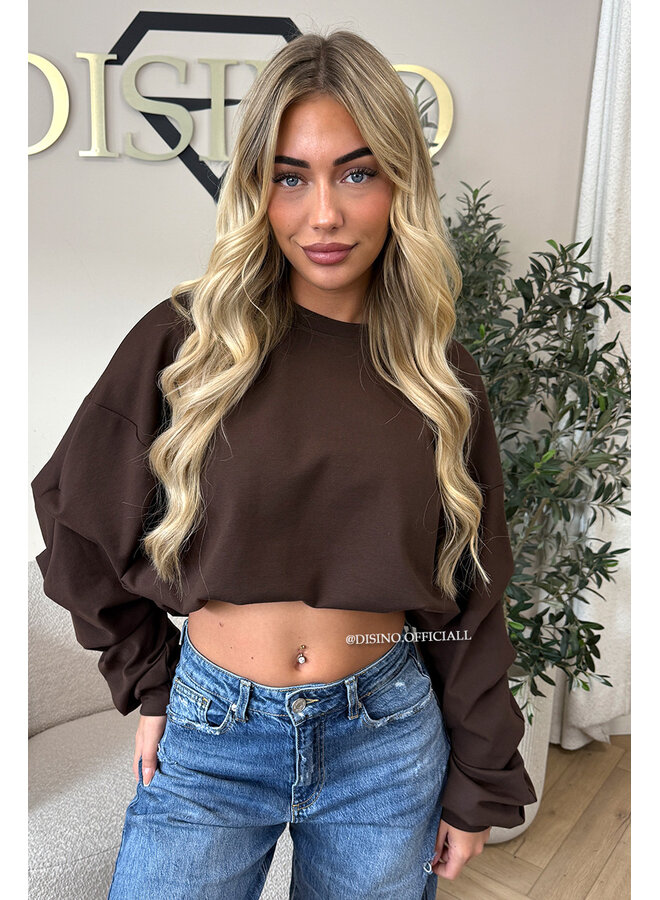 CHOCO - ‘SOLÈNE SWEATER’ – OVERSIZED LAYERED RUFFLE SLEEVE SWEATER
