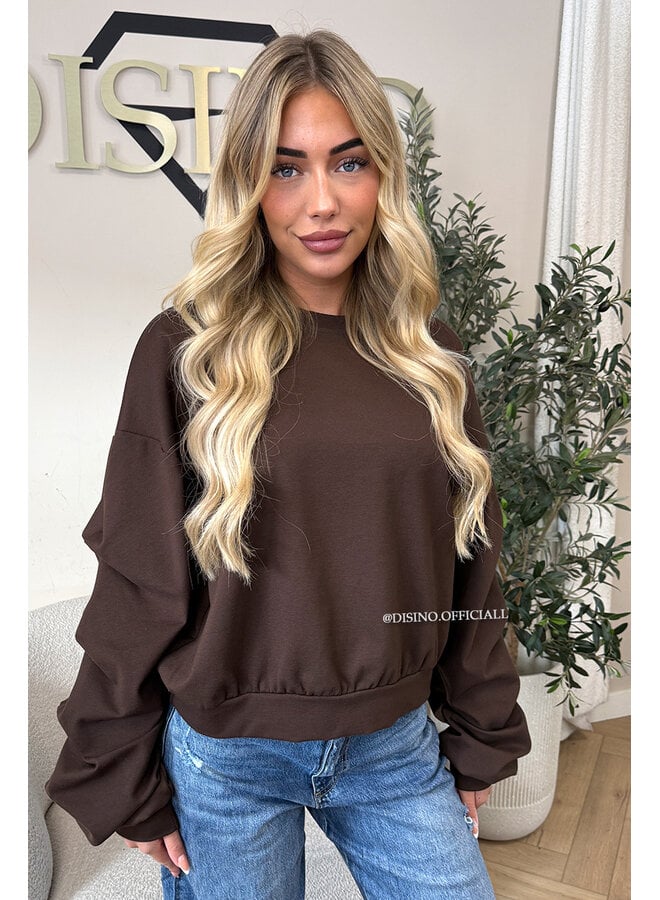 CHOCO - ‘SOLÈNE SWEATER’ – OVERSIZED LAYERED RUFFLE SLEEVE SWEATER