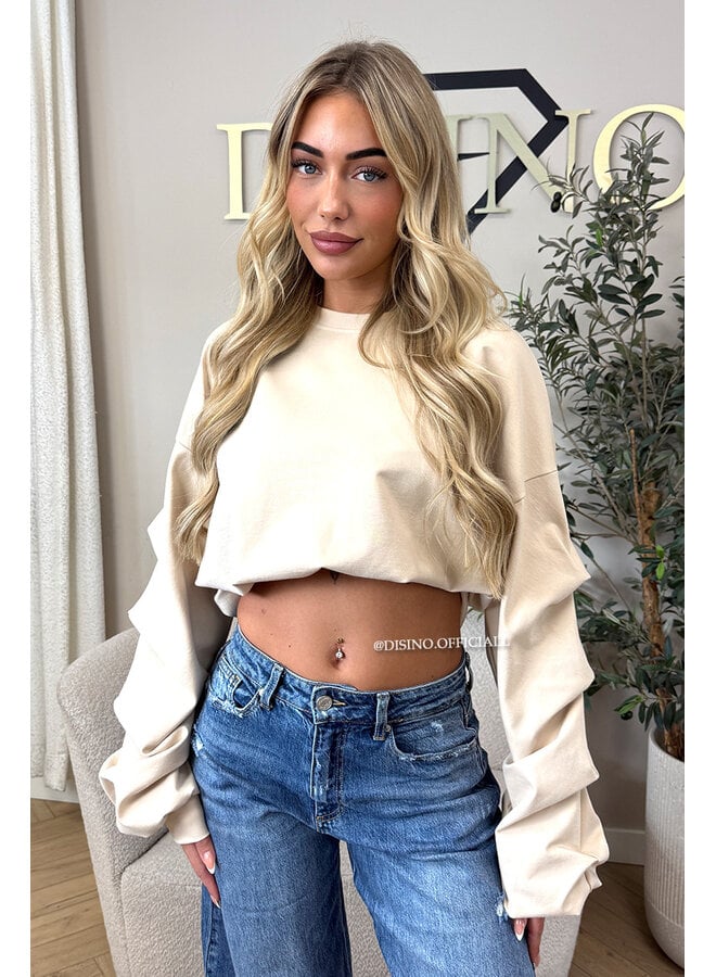 BEIGE - ‘SOLÈNE SWEATER’ – OVERSIZED LAYERED RUFFLE SLEEVE SWEATER