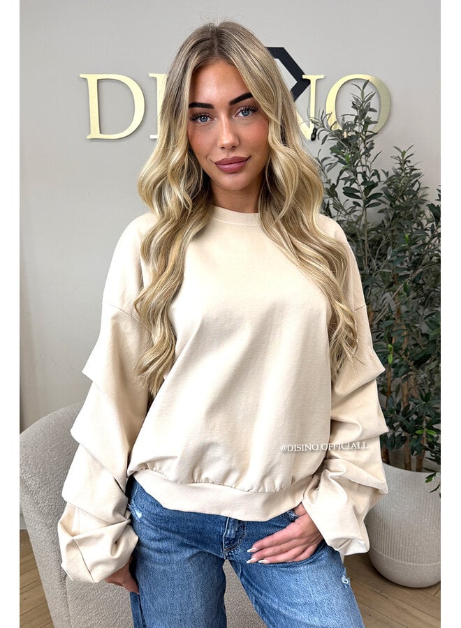 BEIGE - ‘SOLÈNE SWEATER’ – OVERSIZED LAYERED RUFFLE SLEEVE SWEATER