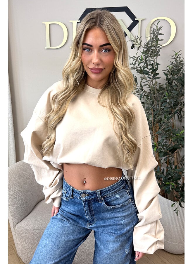 BEIGE - ‘SOLÈNE SWEATER’ – OVERSIZED LAYERED RUFFLE SLEEVE SWEATER