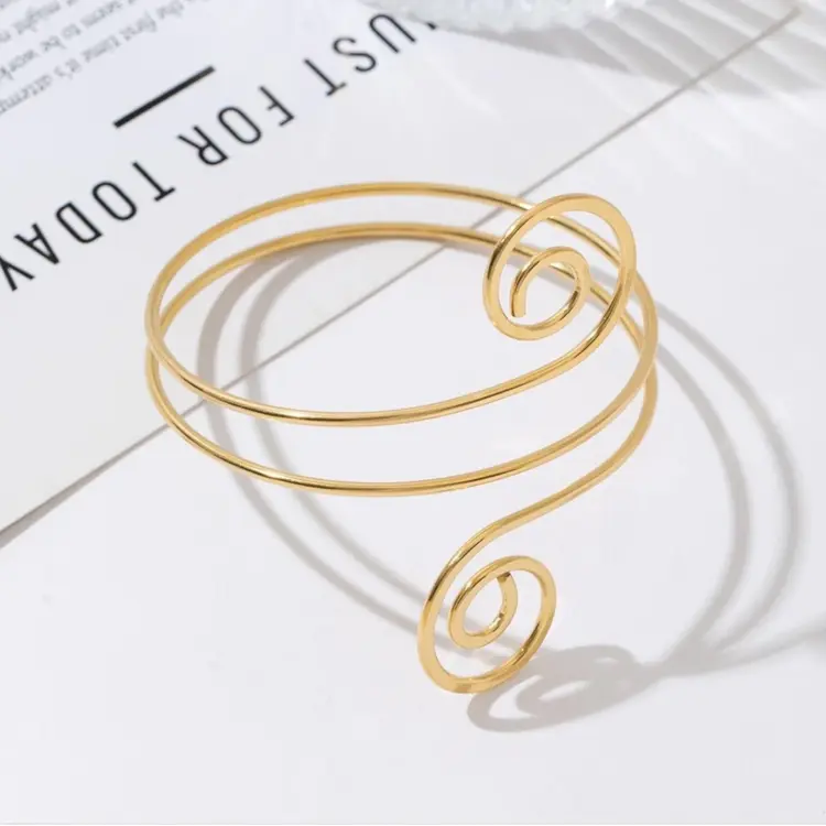 Gold Spiral Above Bracelet