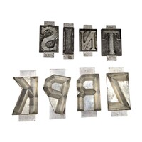 Eight chocolate letter molds