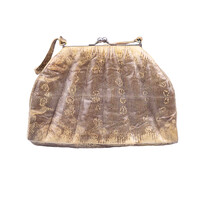 Handtas van hagedissenleer