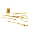 Golden five-piece sewing set in leather box 14 krt