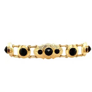 Gold bracelet with garnet 14 krt
