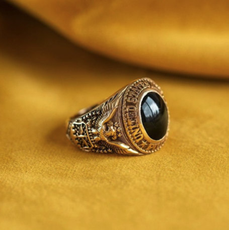 Gold ring with onyx