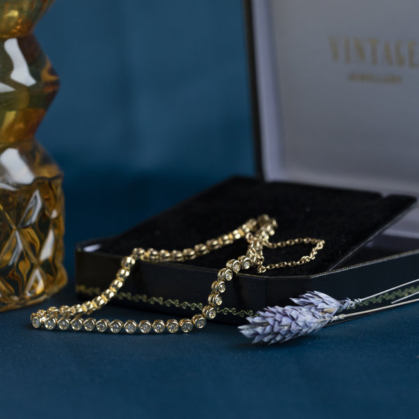 Gouden tennisarmband met diamant 19 cm 18 krt