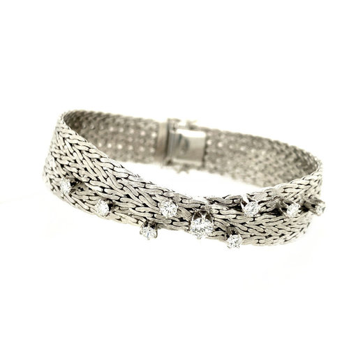 White gold braided bracelet with diamond 14 krt