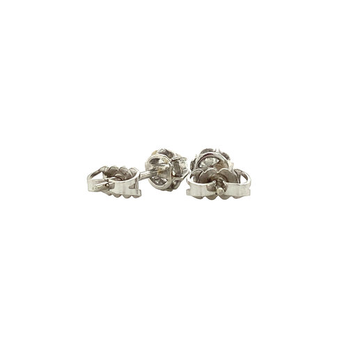 White gold solitaire stud earrings 14 kt