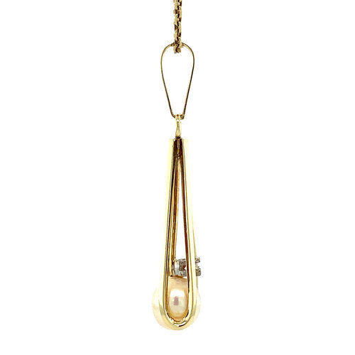 Gold pendant with diamond and pearl 14 crt